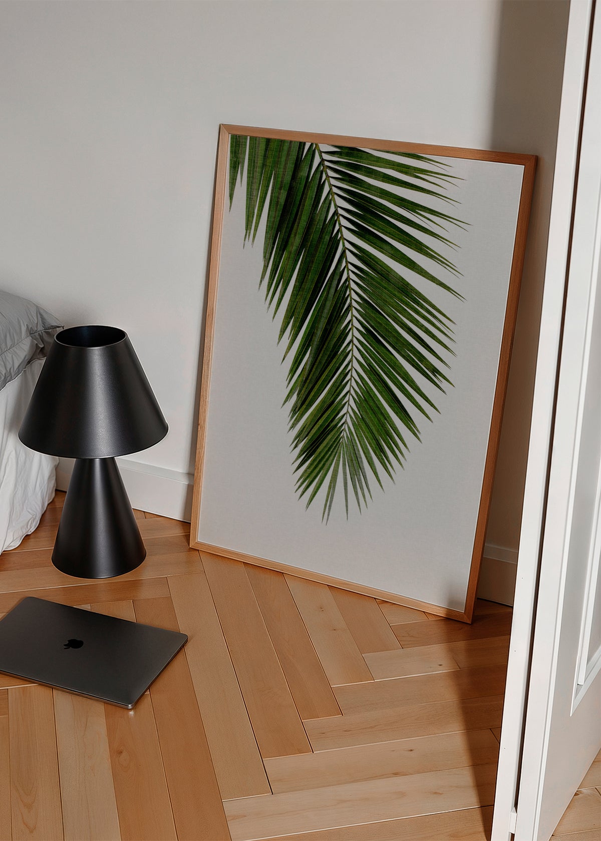 Palm Leaf I - Framed poster in an interior