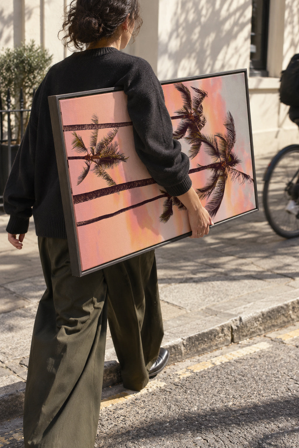 Sunset Palm Trees - Framed canvas in an interior
