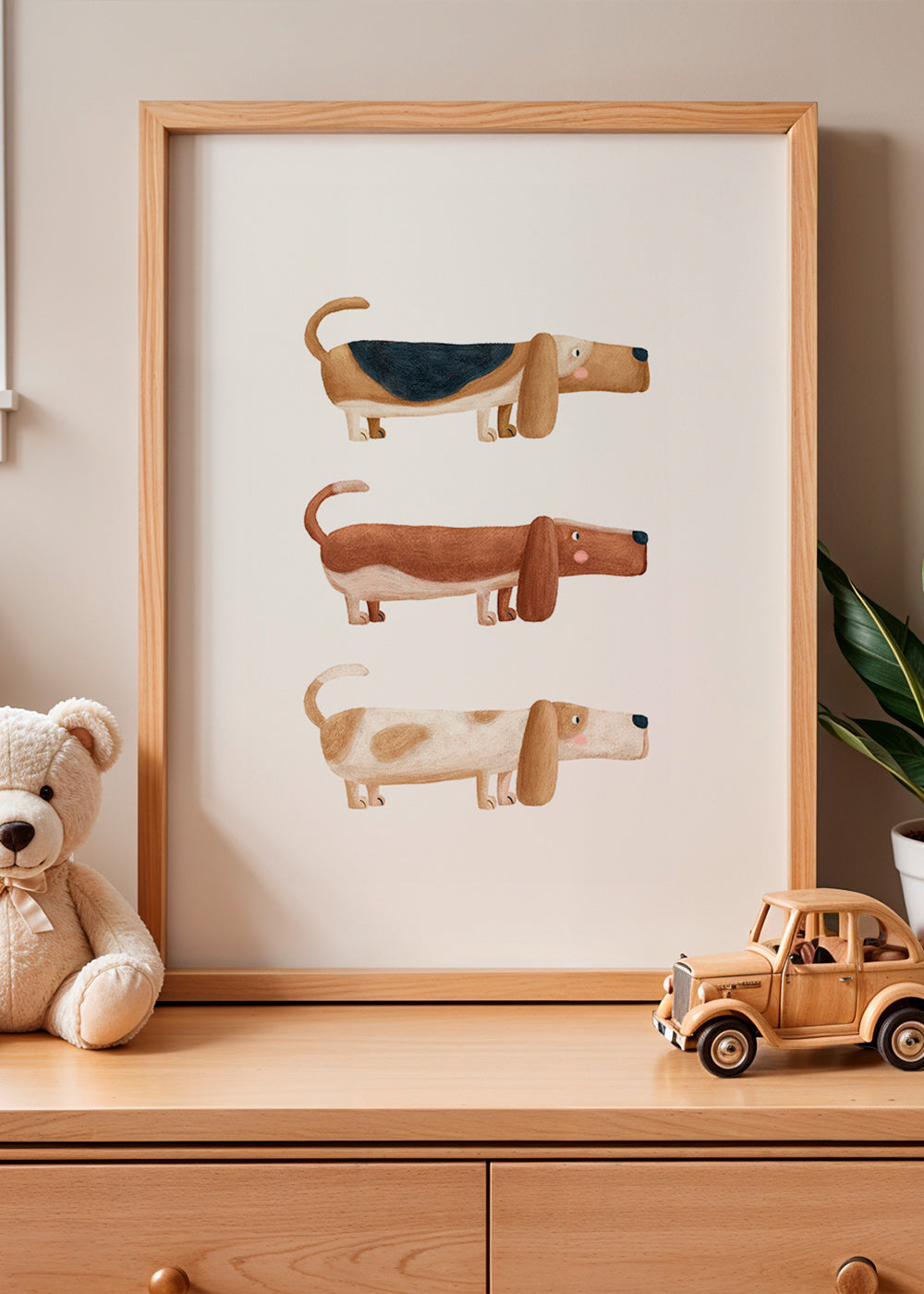 Kinderbild drei Dackel nebeneinander
