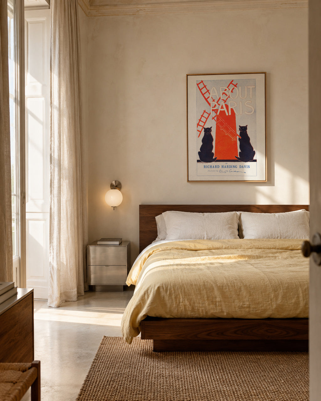 About Paris Vintage poster by Edward Penfield - Framed canvas in an interior