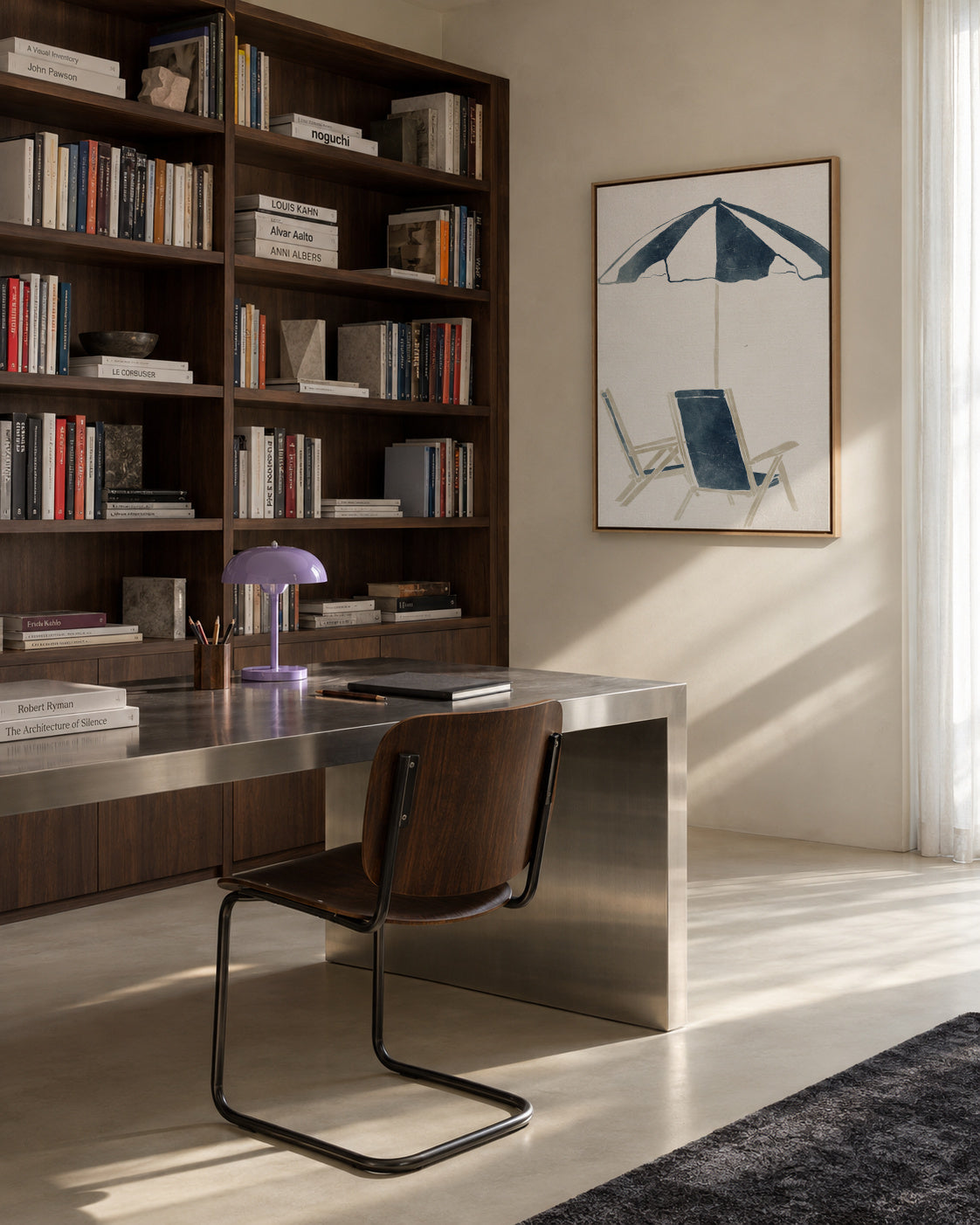 Blue Umbrella and Chairs - Framed canvas in an interior