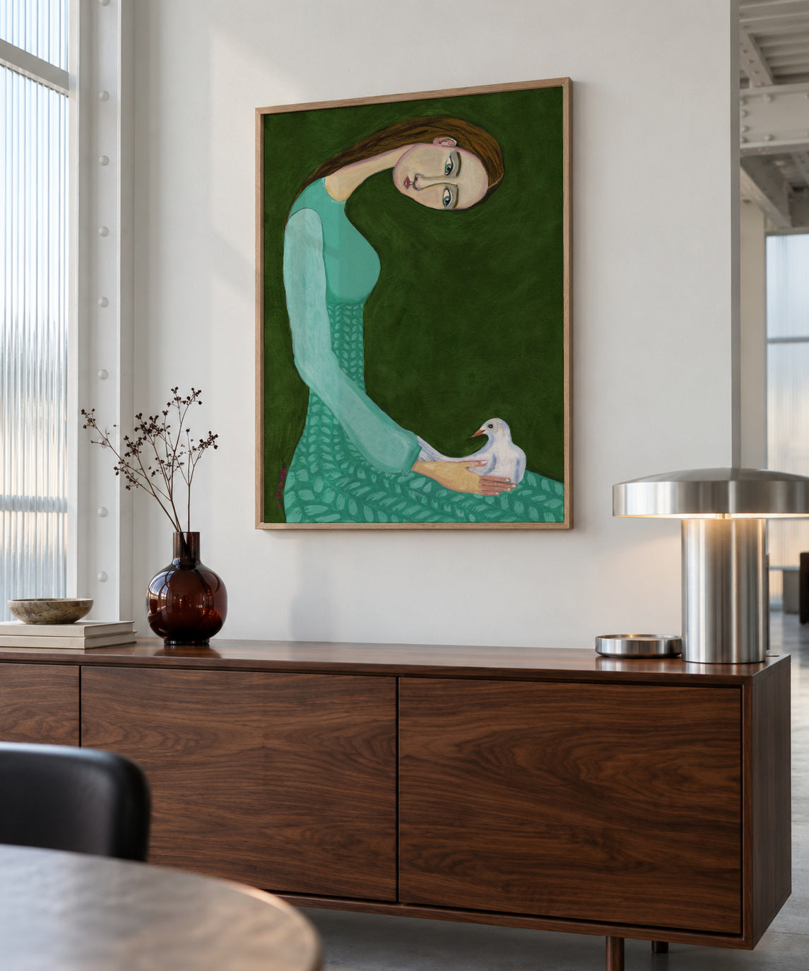 Lady sitting with white dove bird woman - Framed poster in an interior
