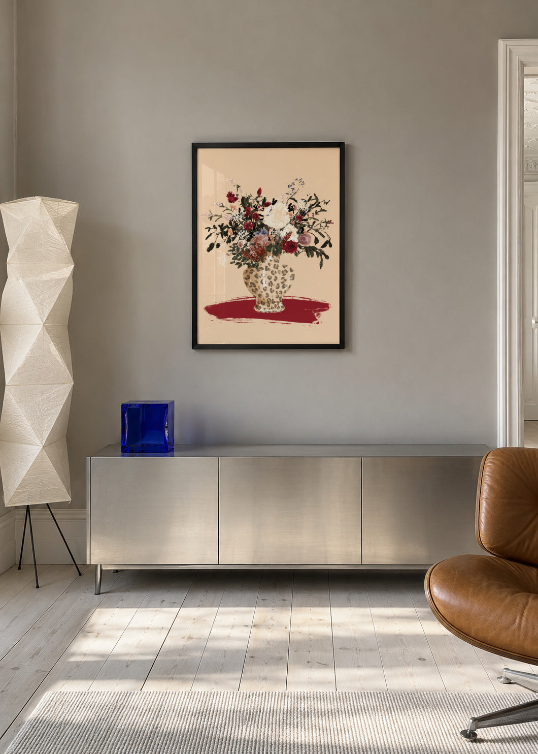 Flowers in a leopard vase - Framed poster in an interior
