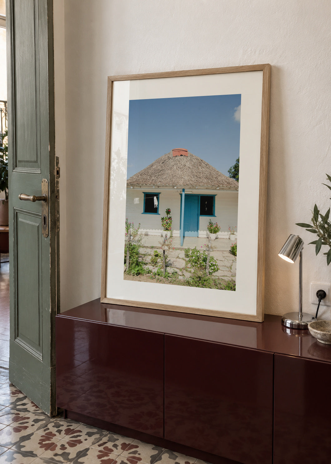 Blue House - Framed poster in an interior