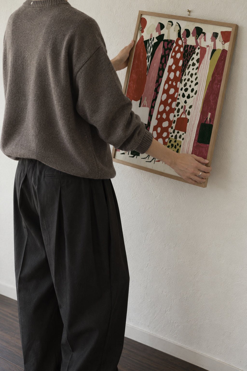 The Fashion Crowd - Framed poster in an interior