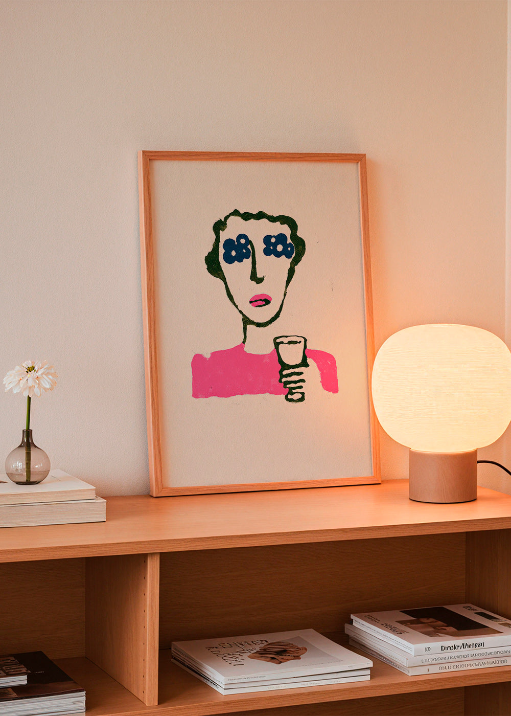 Illustration mit Blumenaugen und Becher