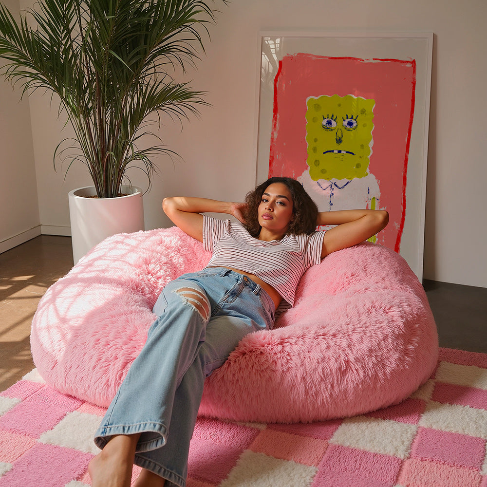 Schwamm-Figur Illustration vor rosa Hintergrund
